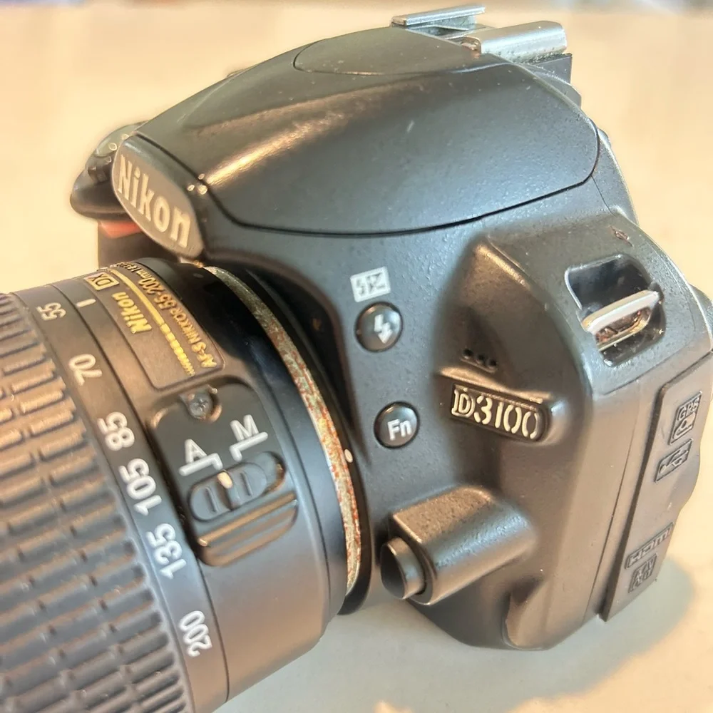 Nikon D3100 DSLR Camera with 55-200mm lens